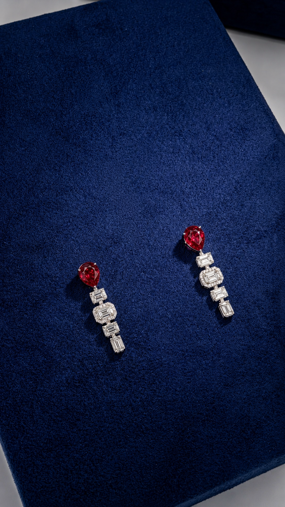 4.68 Carat Pear shaped Lab Ruby in 14KWG Earrings