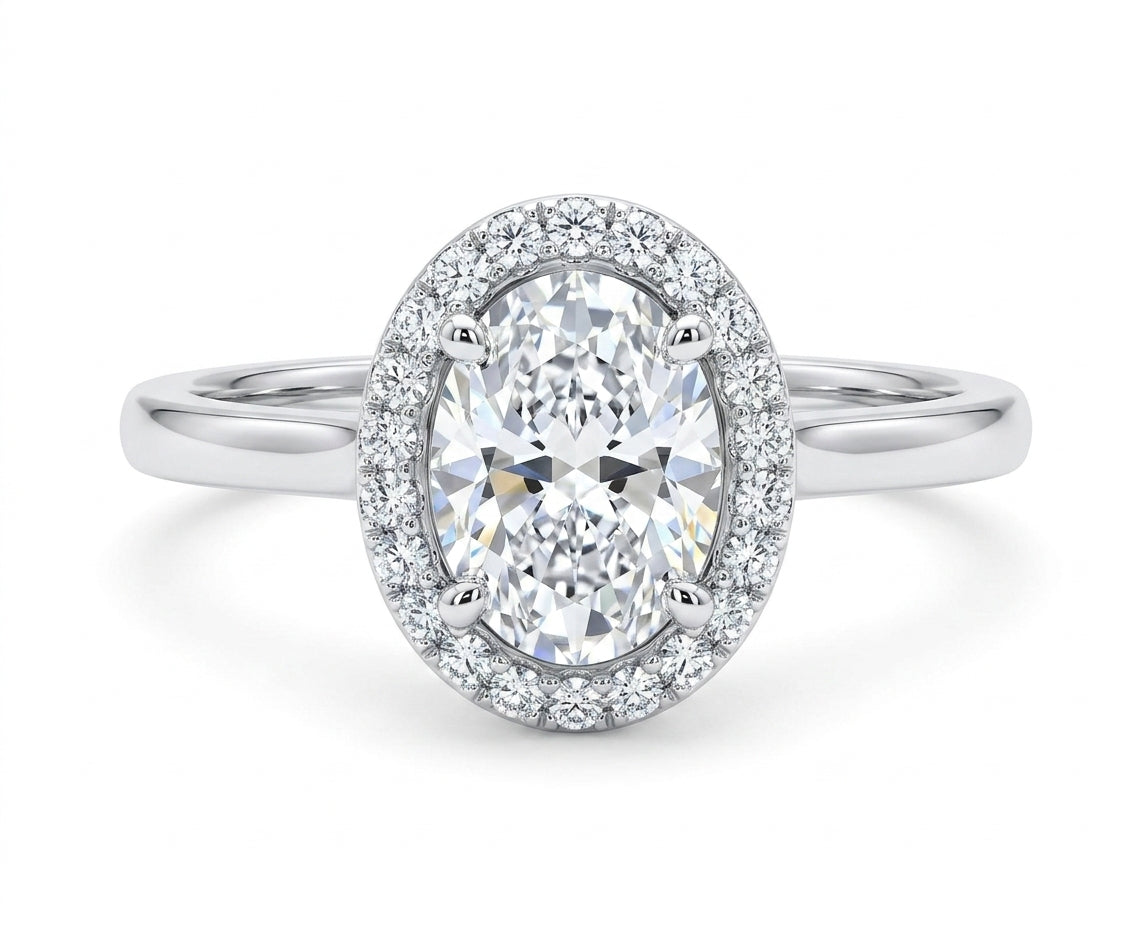 0.56 Carat Oval cut Lab Diamond in 18K WG ring