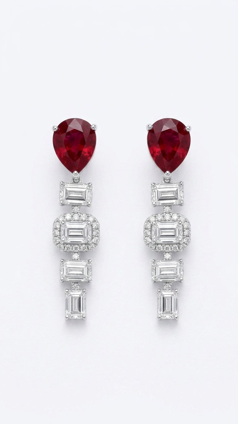 4.68 Carat Pear shaped Lab Ruby in 14KWG Earrings