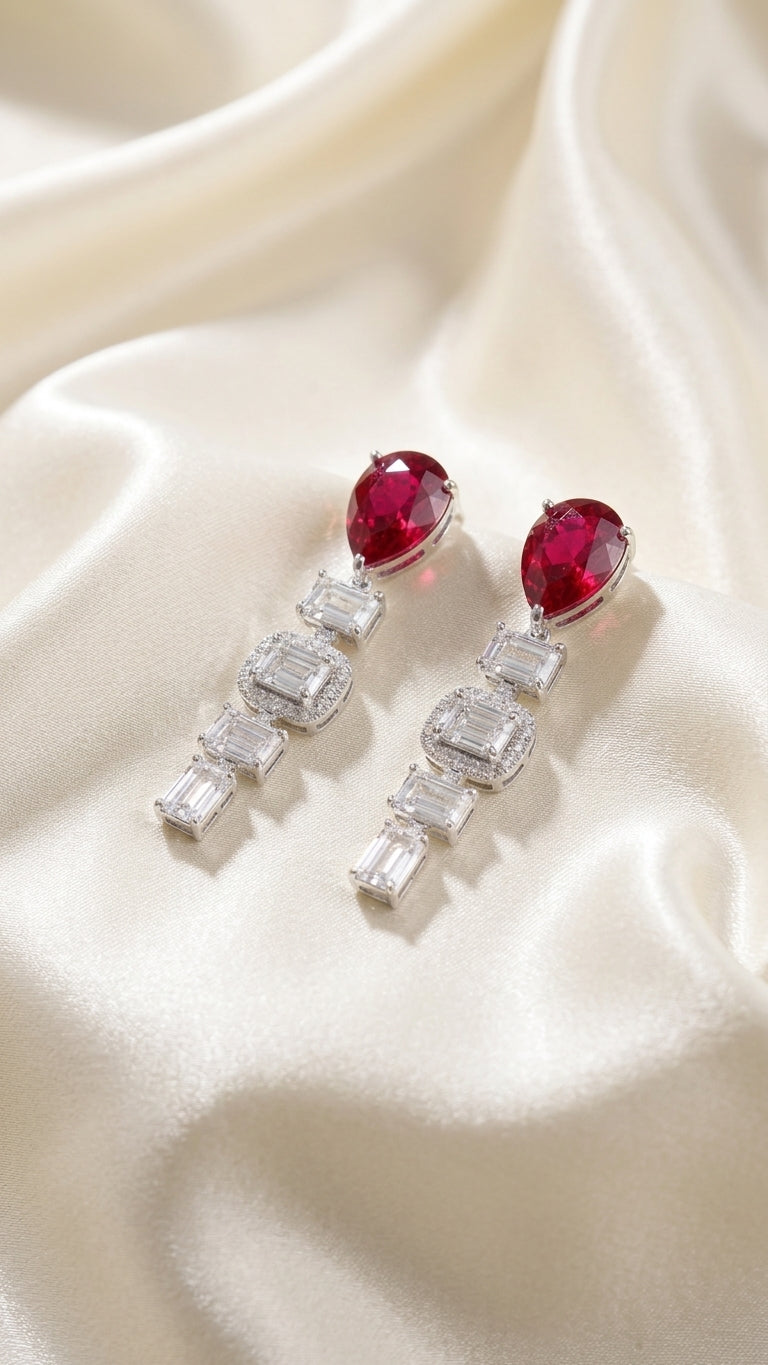 4.68 Carat Pear shaped Lab Ruby in 14KWG Earrings