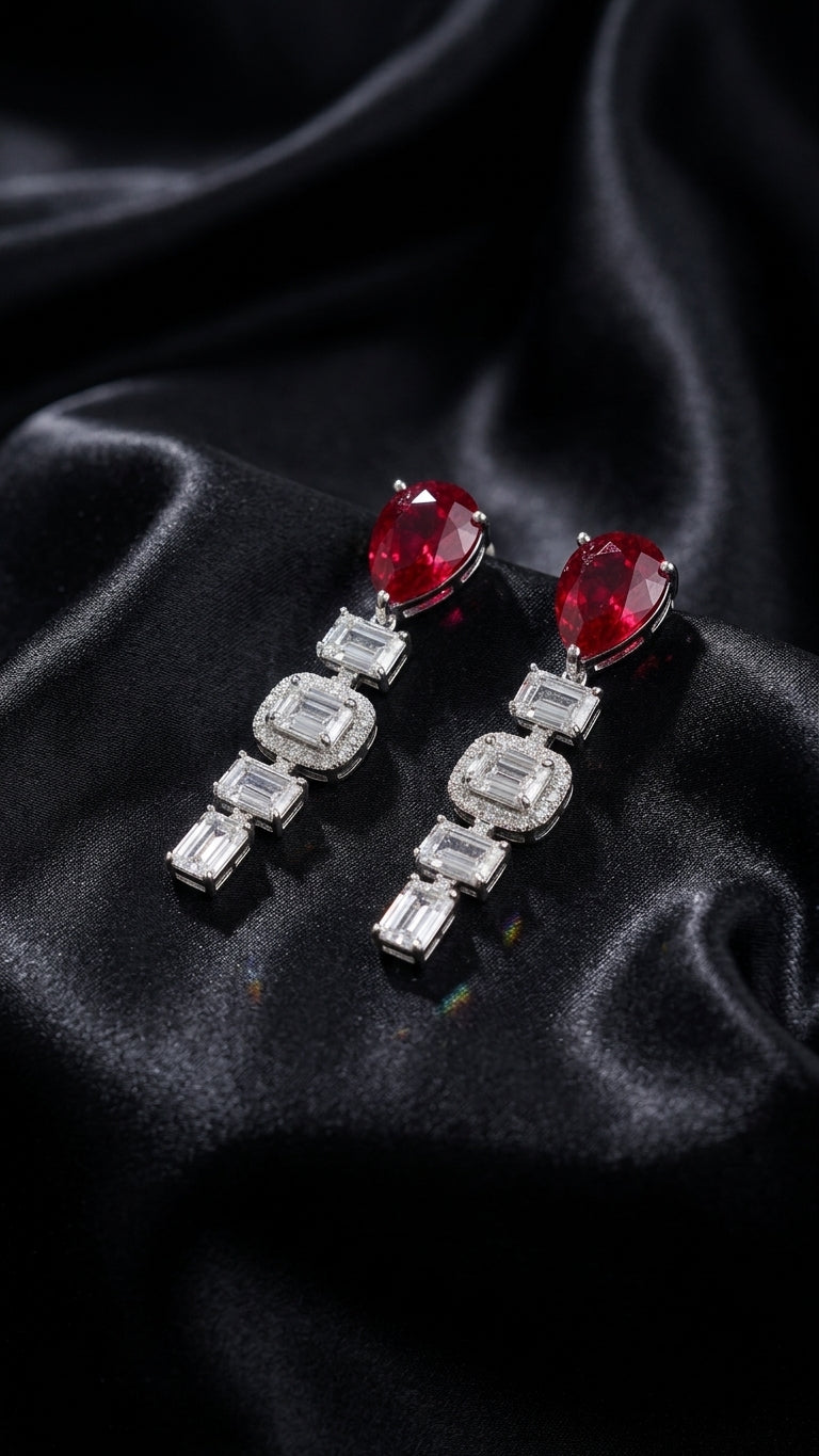 4.68 Carat Pear shaped Lab Ruby in 14KWG Earrings