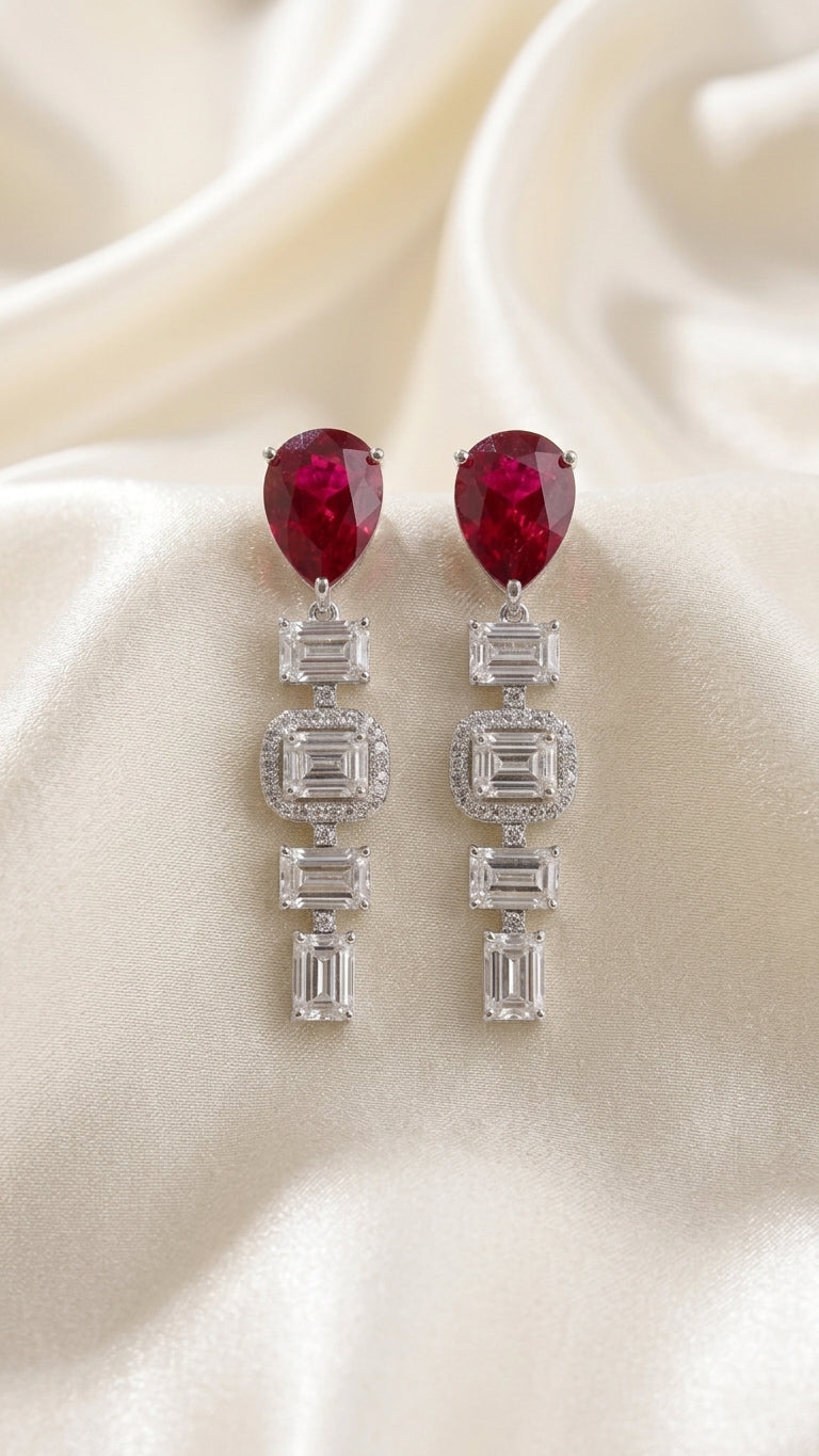 4.68 Carat Pear shaped Lab Ruby in 14KWG Earrings