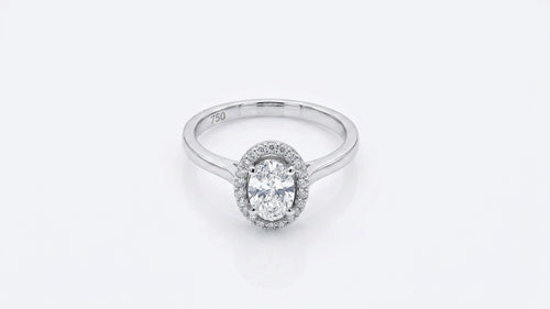 0.56 Carat Oval cut Lab Diamond in 18K WG ring