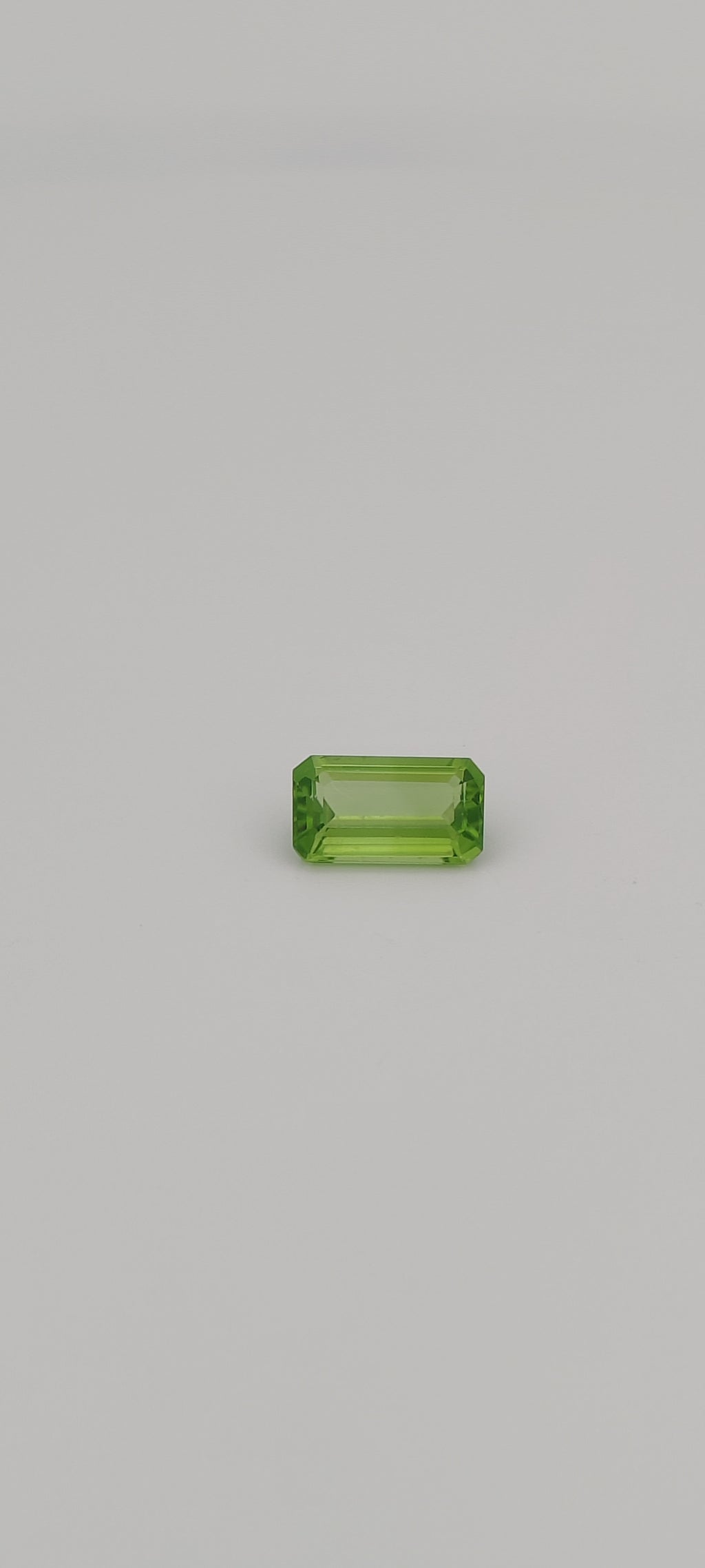 3.05 Carat Loose Gemstone Green Peridot Elongated Emerald shape