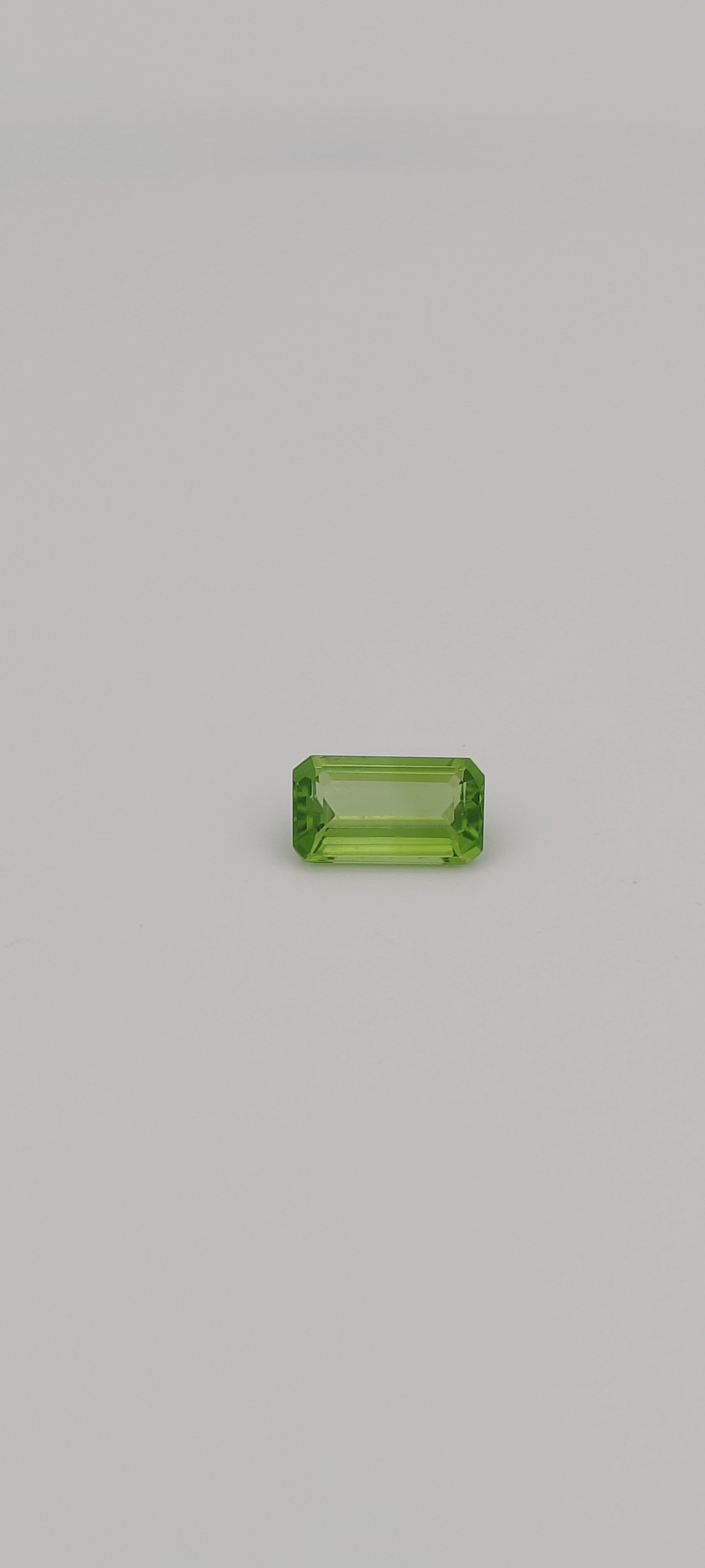 3.05 Carat Loose Gemstone Green Peridot Elongated Emerald shape