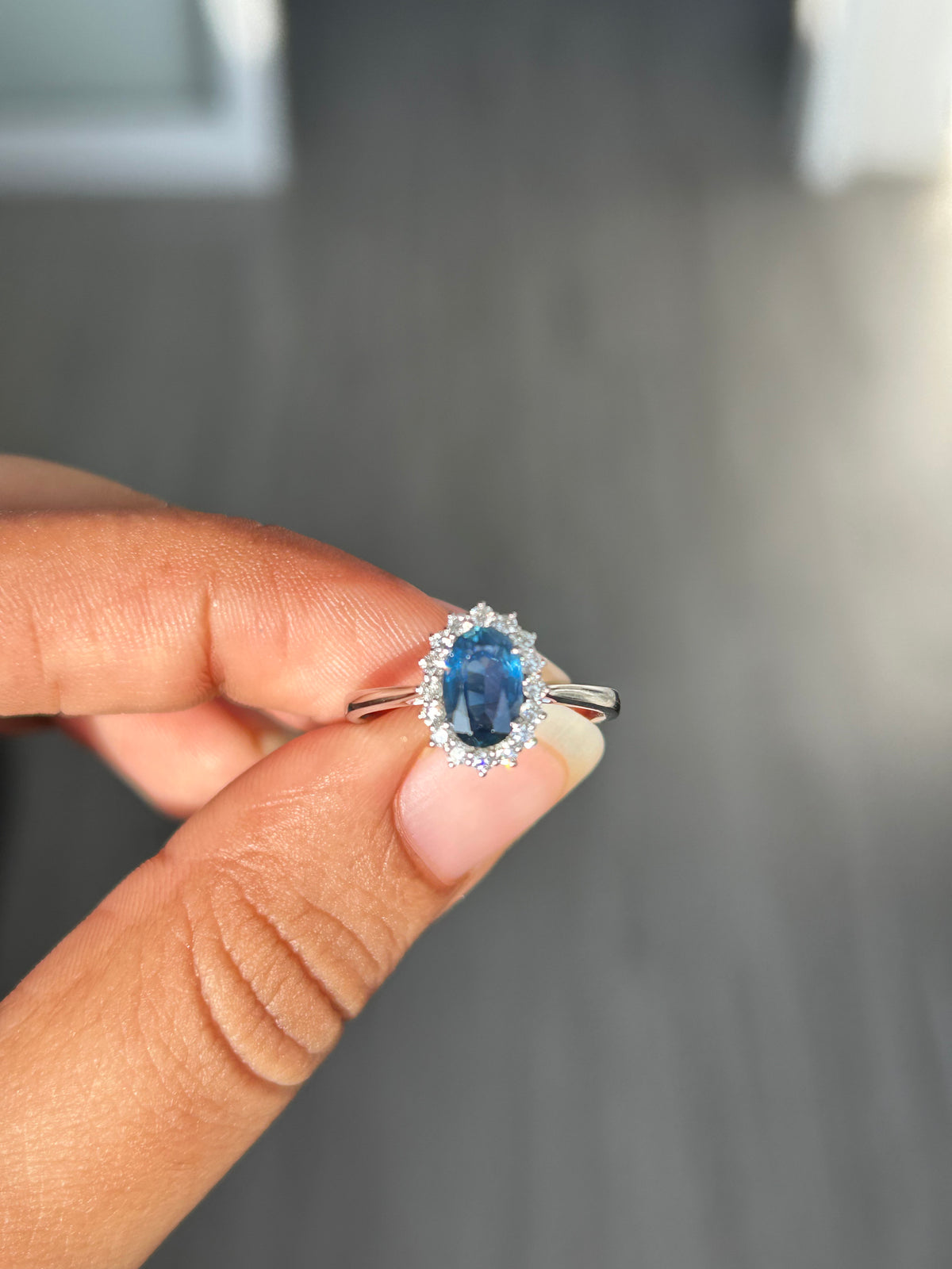 1.11 ct Oval Blue Sapphire Halo Ring in 14K White Gold
