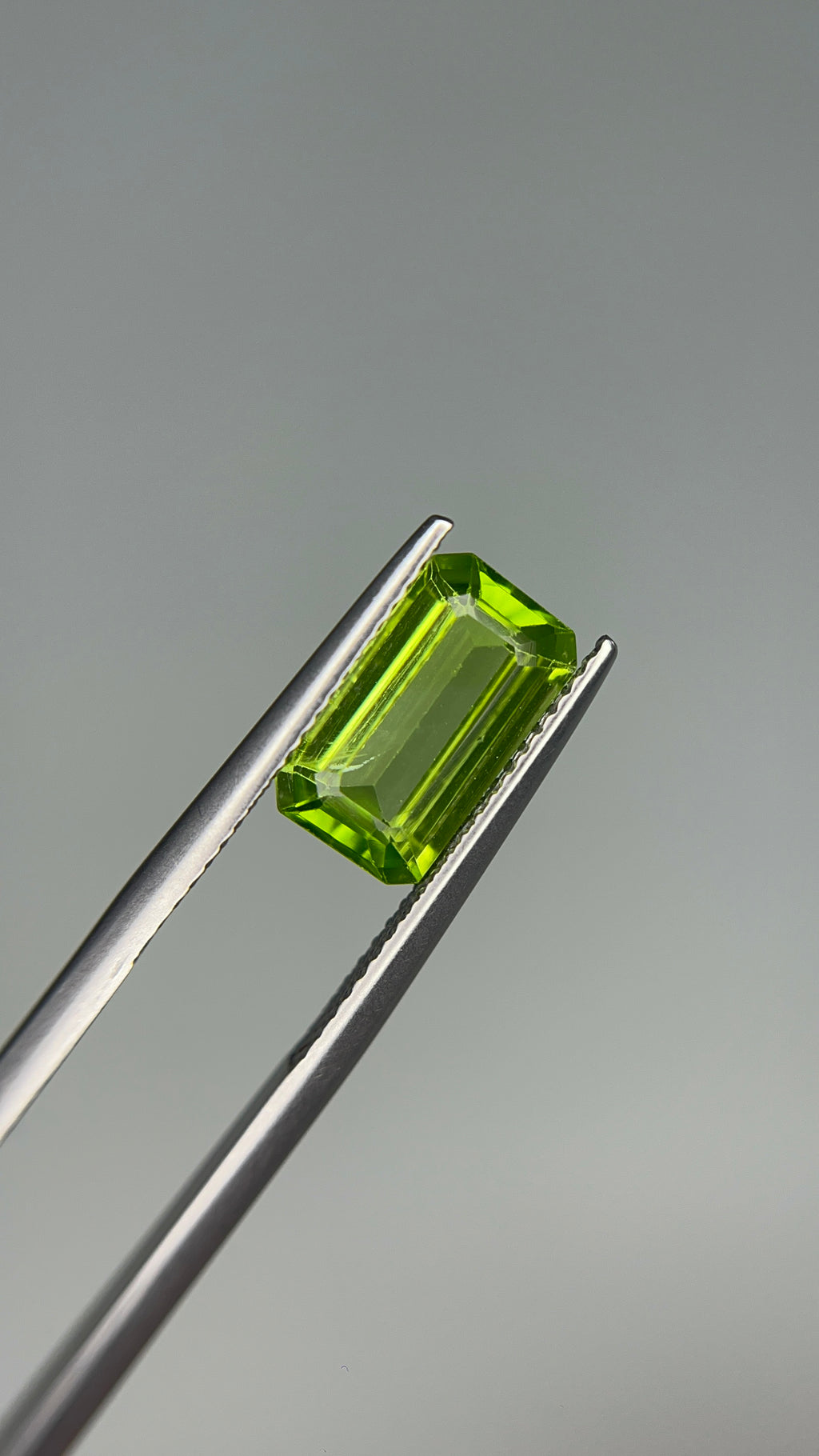 3.05 Carat Loose Gemstone Green Peridot Elongated Emerald shape