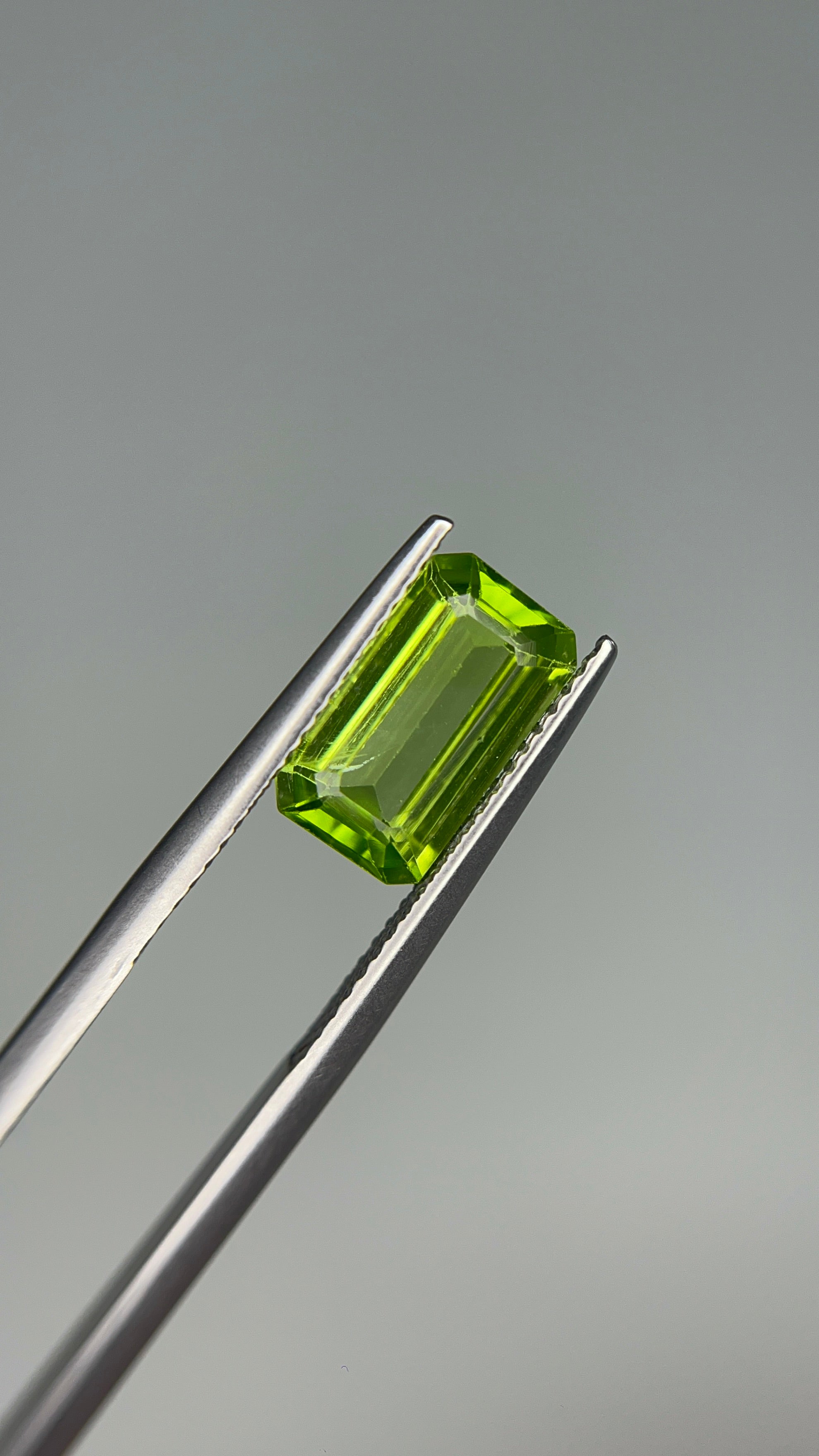 3.05 Carat Loose Gemstone Green Peridot Elongated Emerald shape