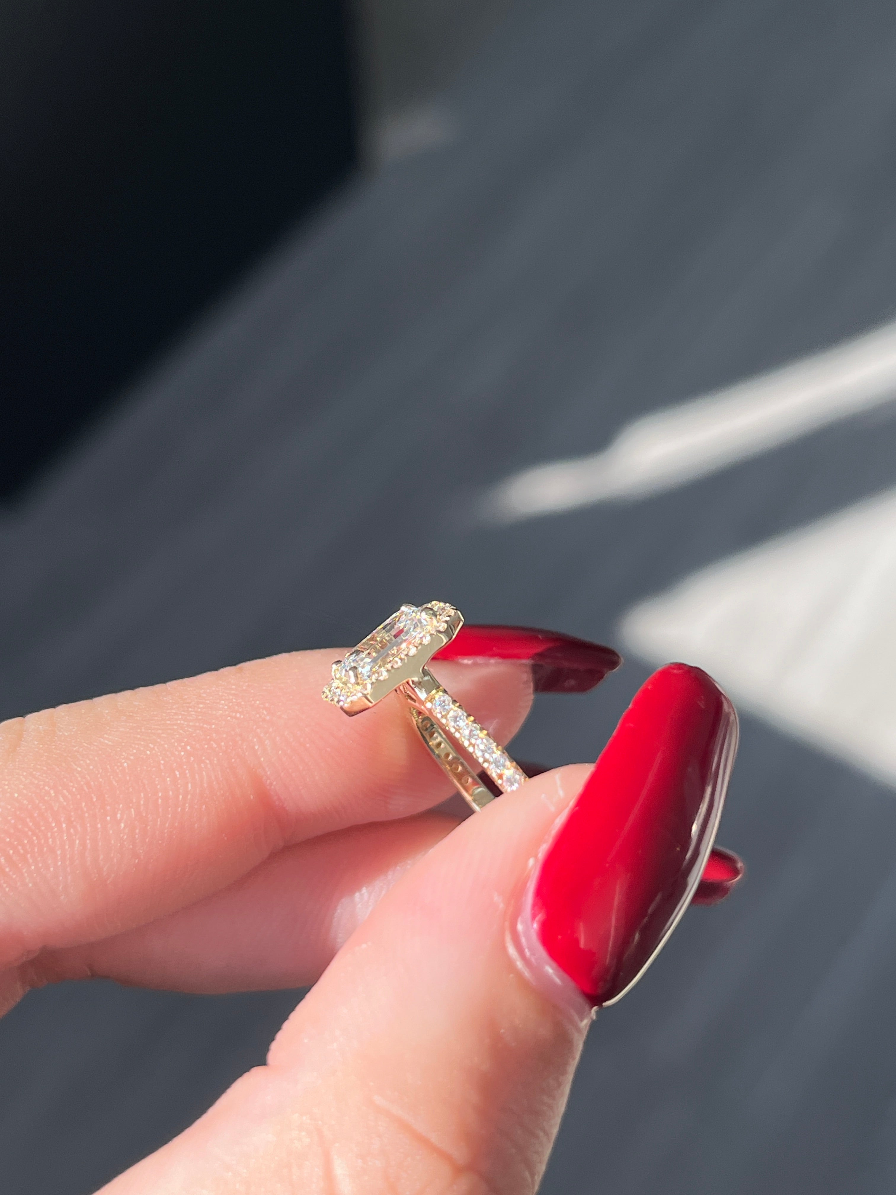 1.09  carat Lab Emerald cut  in  14K YG ring