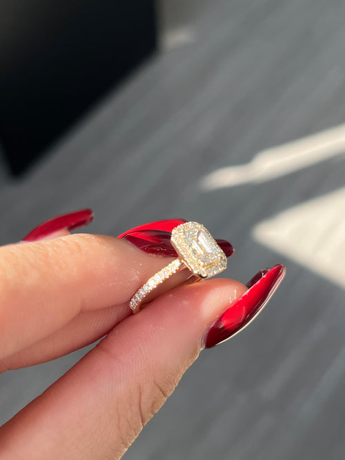 1.09  carat Lab Emerald cut  in  14K YG ring