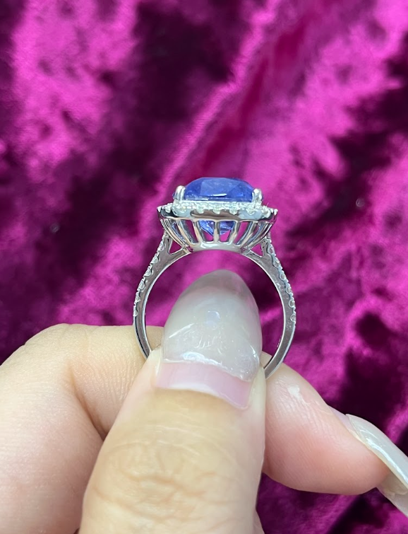 8.22 Carat cushion Sapphire & Halo Diamonds Ring in 18K White Gold