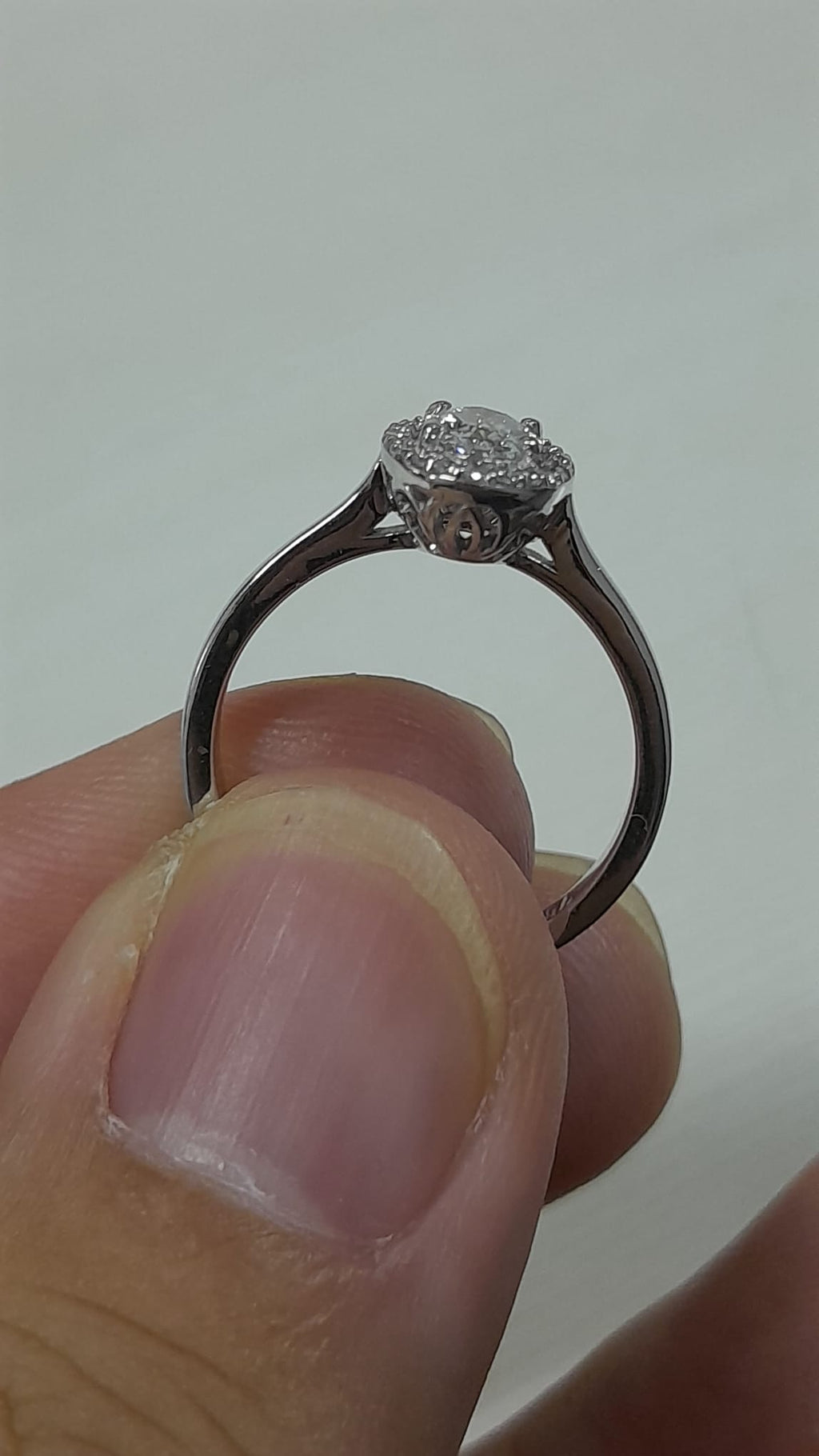 0.56 Carat Oval cut Lab Diamond in 18K WG ring