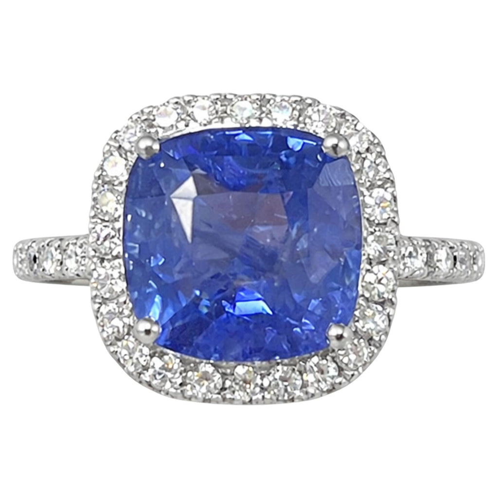 8.22 Carat cushion Sapphire & Halo Diamonds Ring in 18K White Gold
