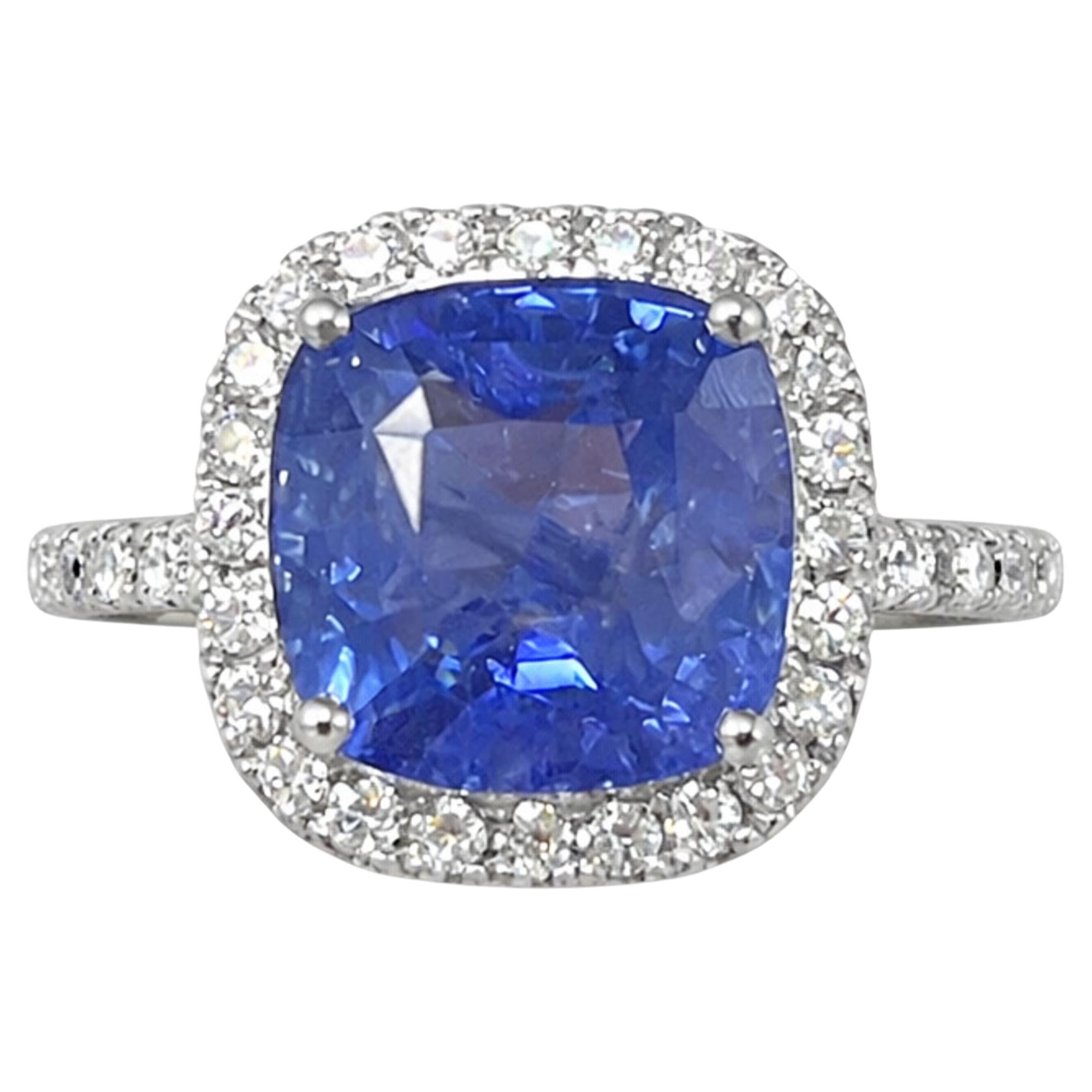 8.22 Carat cushion Sapphire & Halo Diamonds Ring in 18K White Gold