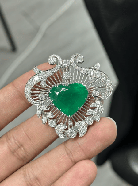 18.52 Carat Emerald Brooch in 18K White Gold