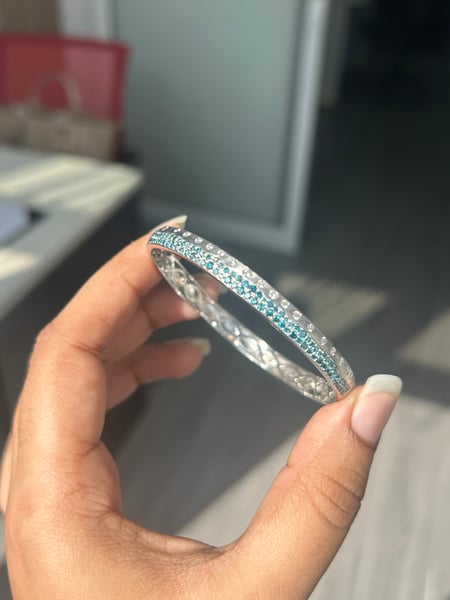 0.47 Carat White diamonds and 1.45 Carat Blue Diamonds in 14K WG Bangle