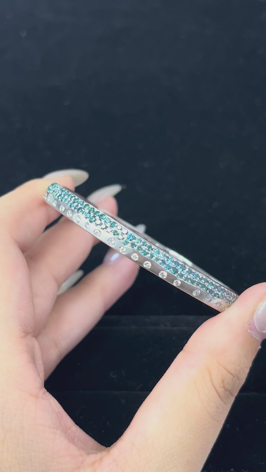 0.47 Carat White diamonds and 1.45 Carat Blue Diamonds in 14K WG Bangle